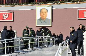 Mao portrait in Beijing apparently vandalized