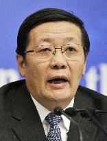 Chinese Finance Minister Lou meets press