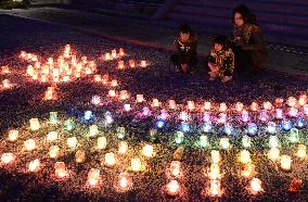 Candles lit to commemorate victims of 2011 disaster