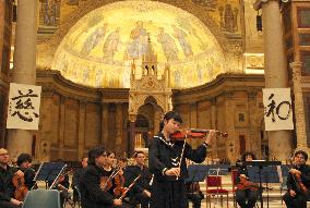 Quake's 3rd anniversary concert at Rome cathedral