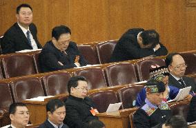 Members of Chinese parliament doze off during session