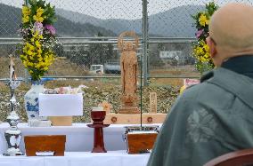 Guardian deity carved out of tsunami-hit cherry trees