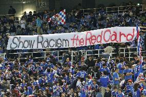 Marinos supporters put up banner against racism