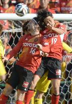 Nagoya's Kennedy, Yano in action against Kashiwa