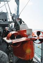 U.S. minesweeper Defender shown to press at Moji Port