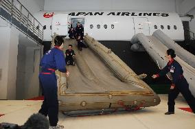 JAL's evacuation drill at Haneda training facility