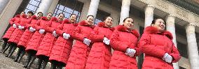 Beijing hotel workers during China's parliament session