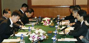 Japan, N. Korea officials sit at negotiating table in China
