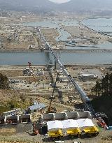 Giant conveyor belt begins operations in Rikuzentakata