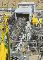 Huge belt conveyor removes sand in quake-hit Rikuzentakata