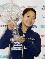 Takanashi holds World Cup trophy