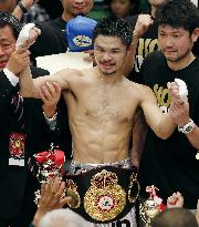 Japan's Kono wears champion belt after regaining WBA title