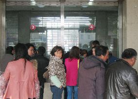 Bank run in Chinese city spreads