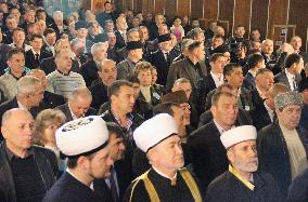 People attend Tatar group meeting in Ukraine