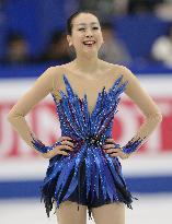 Japan's Asada wins World Figure Skating Championships