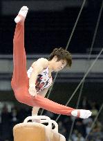 Japan gymnast Kato on pommel horse at Tokyo World Cup
