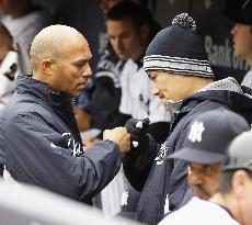 Yankees' Tanaka shares fist bump with Rivera