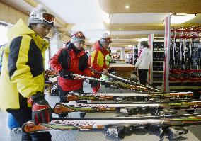 People rent skis at N. Korean ski resort