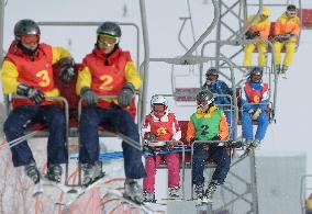 People on ski lift at N. Korean ski resort