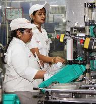 Women work at Denso factory in India