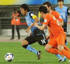 Kawasaki's Nakamura in action against Guizhou in ACL