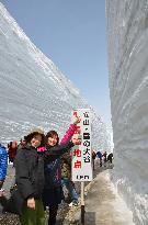 Central Japan's snow-walled mountain road fully reopens