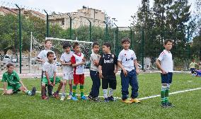 Children practice soccer in Algiers