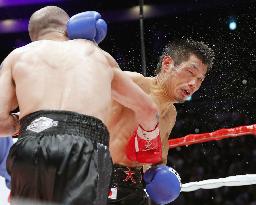 Spain's Martinez beats Japan's Hasegawa by TKO