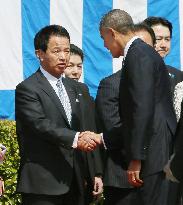 Trade negotiator Amari greets Obama at welcome event