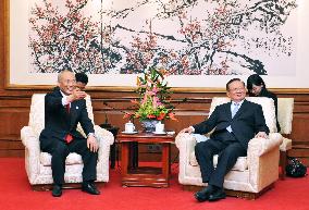 Tokyo governor in China