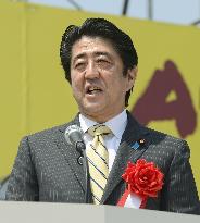 Japan PM Abe pledges to spread benefit of economic recovery
