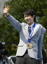 Sochi gold medalist Hanyu honored in parade in disaster-hit hometown