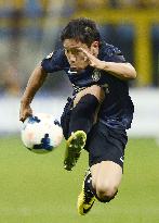 Milan's Nagatomo in action against Napoli in Serie A game
