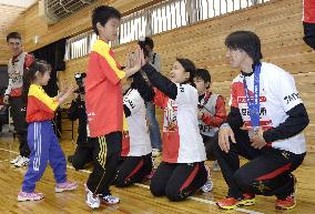 Olympic ski jumpers Kasai, Takanashi meet kids in Iwate town