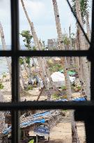 People still living in tents in Philippine island village
