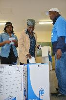 Woman casts vote in South Africa's former black township
