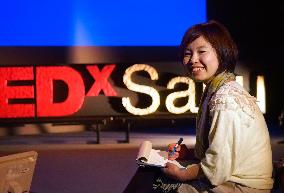 TEDxSaku organizer rehearsing for big day