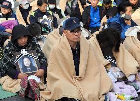 Relatives of sunken ferry victims