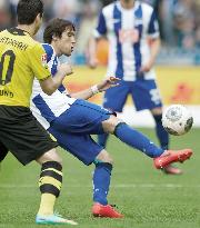 Hertha's Hosogai in action against Dortmund