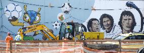 Murals in front of Maracana station