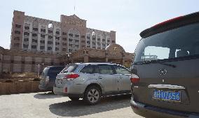 Car with Chinese license plate at N. Korean hotel