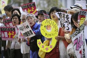 Protesters over collective self-defense