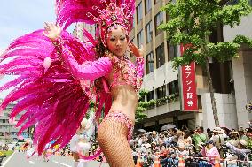 Woman dances samba during Kobe Festival