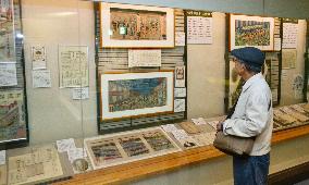 Man looks at old documents at Yokohama Archives of History
