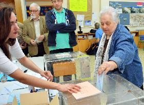 Woman votes in local elections in Greece