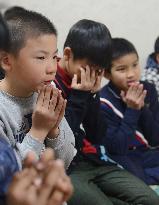 Myanmar kids born in Japan chant sutra