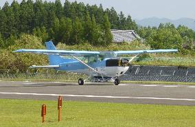 Prototype electric plane makes trial ground run in Japan