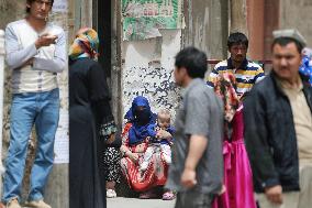 People in Hotan, Xinjiang Uygur Autonomous Region