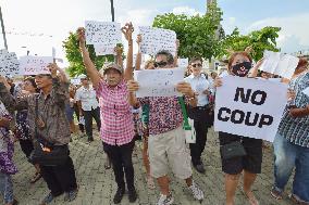 Thaksin supporters protest military coup in Thailand