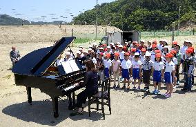 2011 tsunami-surviving piano returns to home school